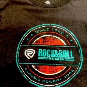 Rock & Roll Denim Company logo T-shirt. A shirt from a brand that cloths Artist